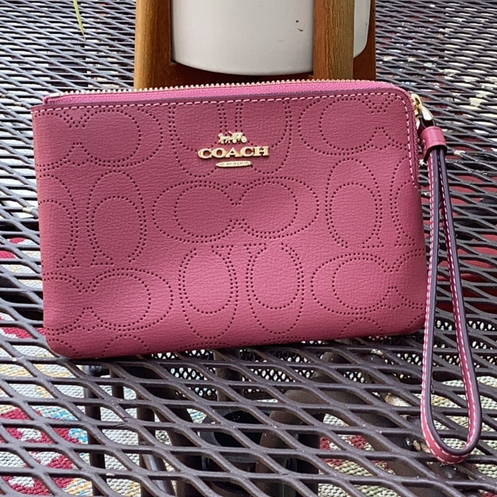 Coach Pink Perforated Signature Wristlet with Gold Logo